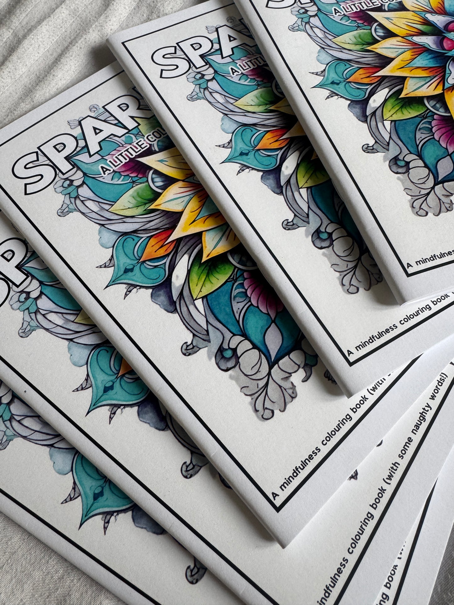 Spark A Life Colouring Book