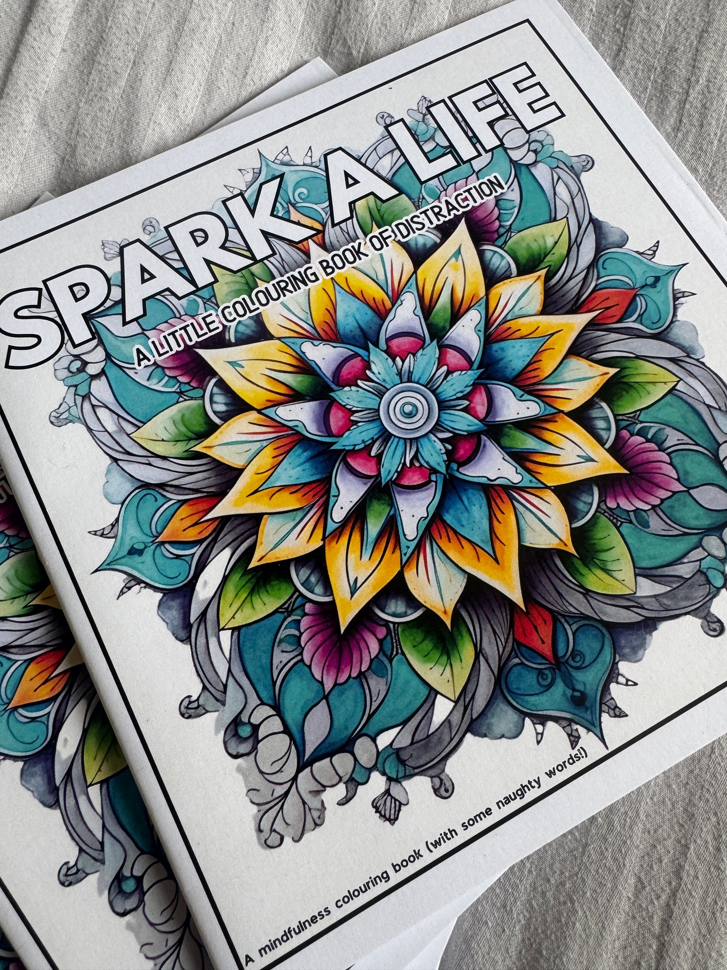 Spark A Life Colouring Book